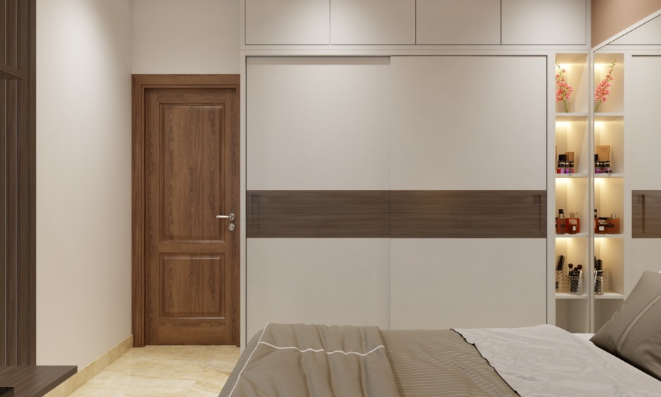 1 bhk bedroom design features a sliding wardrobe with attached open shelves