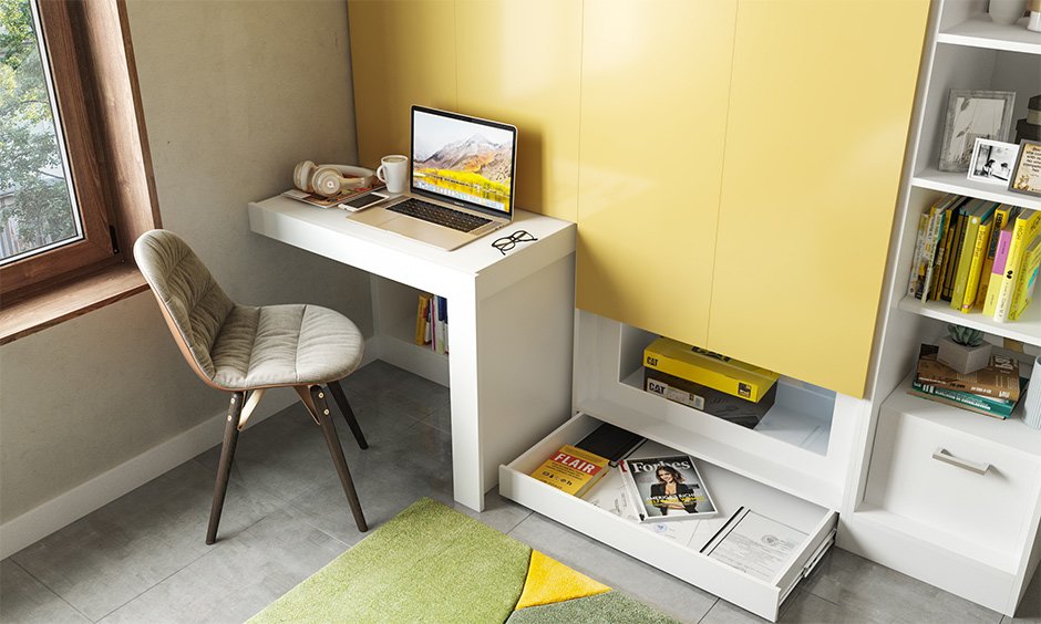 10 by 12 bedroom interior design with a pull-out study table gives you a cozy study nook