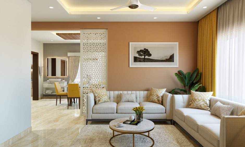 1 BHK home living room has two sofa units and a coffee table