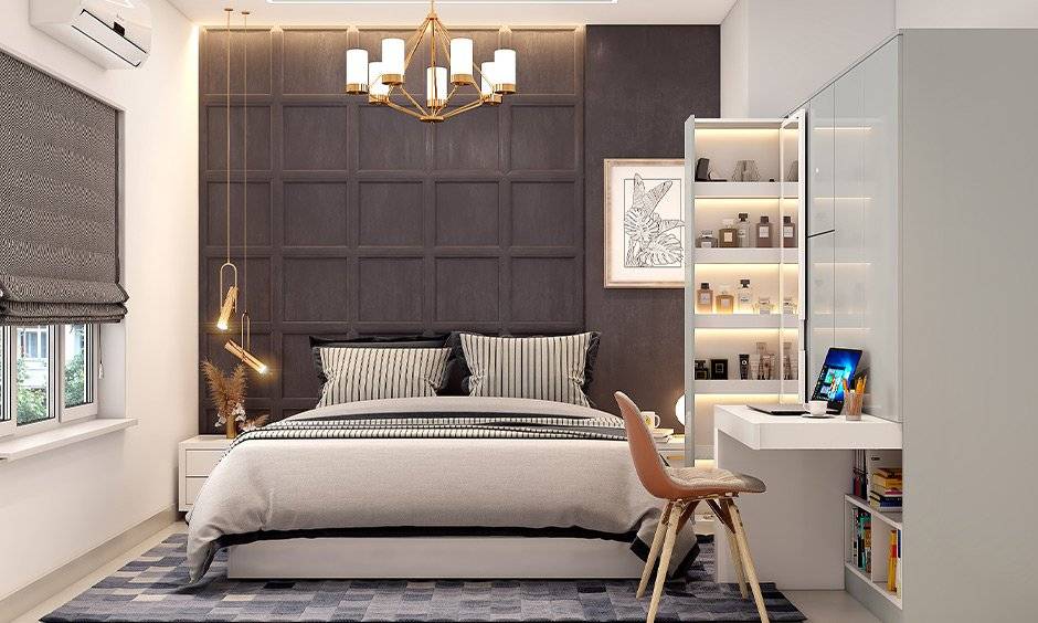 Bedroom wardrobe storage with a pull-out study table and a dresser is a significant organising interior element