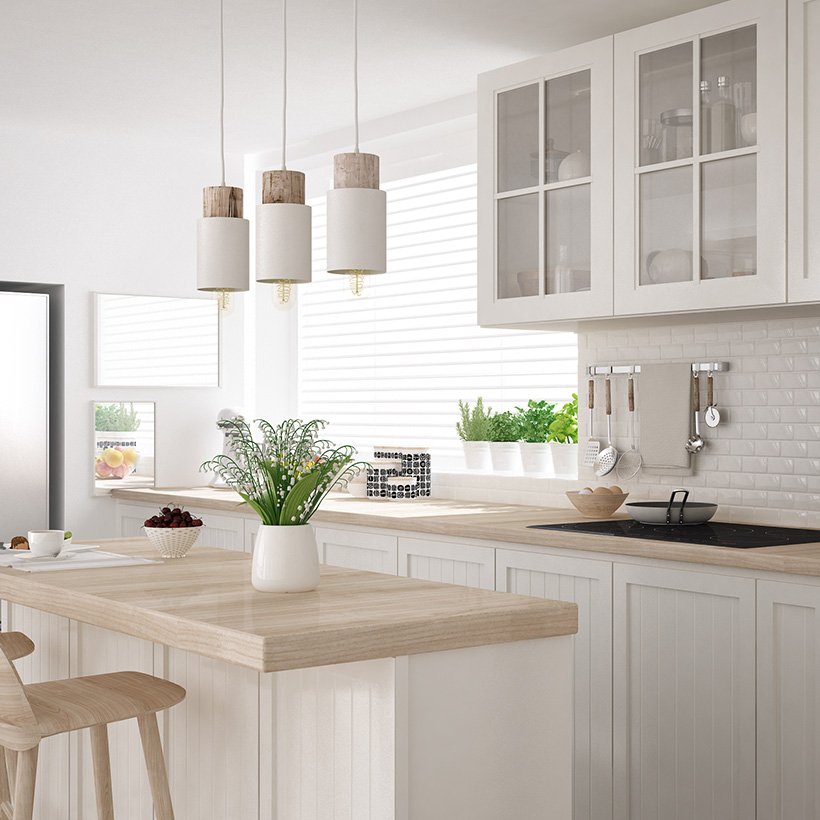 Glass kitchen cabinets with wooden in white colour and large shutters on the bottom in kitchen glass cabinet designs