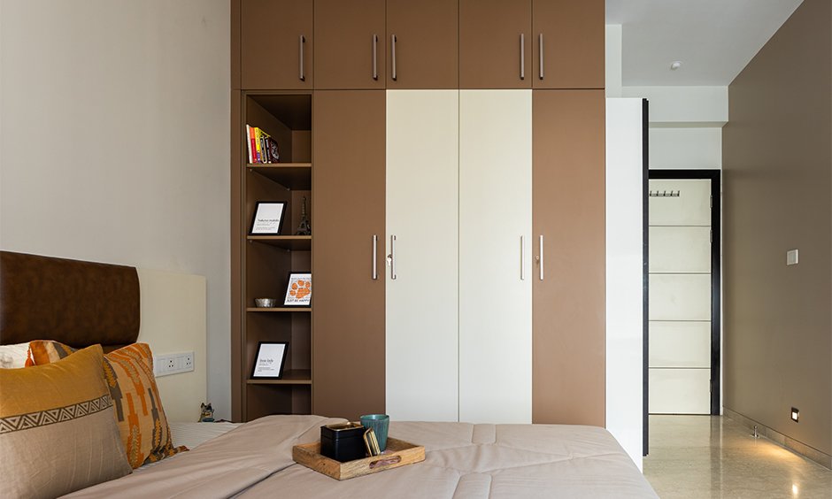 Interior design for home in mumbai designed in slightly deeper hues to cut the monotony of neutral tones