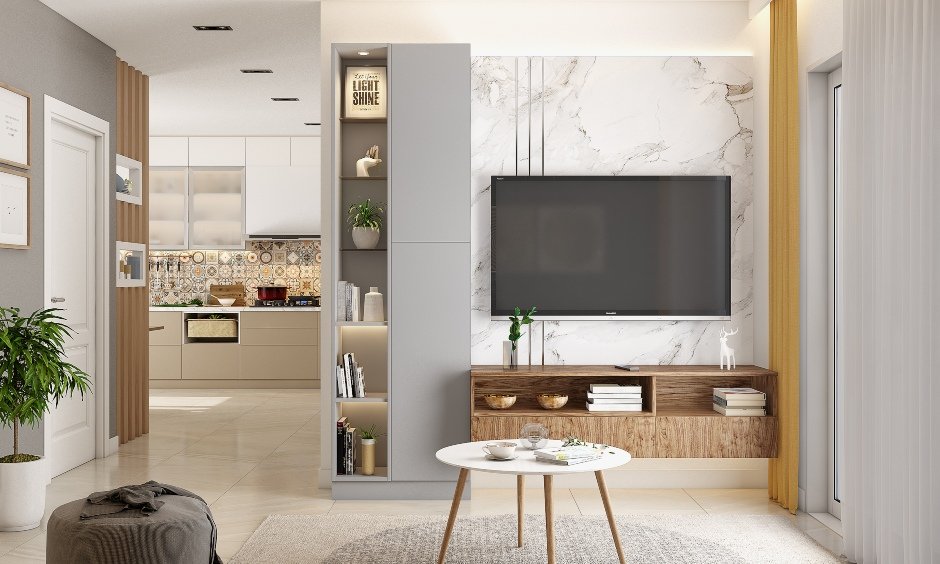Interior design in chennai where the entertainment unit in the living room is designed with a wall-mounted TV