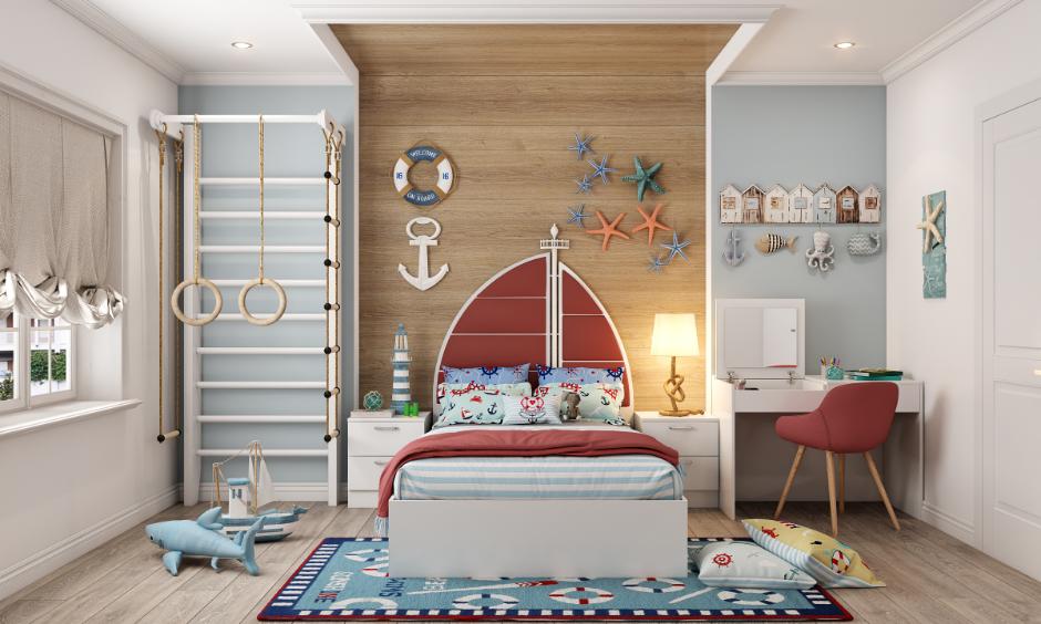 Kids bedroom with grey wall-mounted play ladder, blue mat, and hanging pull-up rings