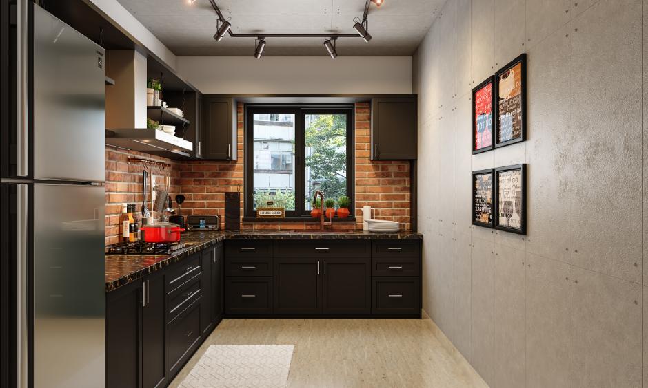 Industrial kitchen with brick cladding tiles, black cabinets, and concrete-textured wall panels