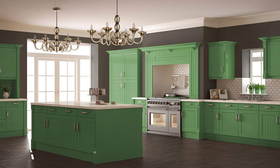 Modern kitchen with two-tone cabinets reflecting kitchen colour trends in 2025 with bold shades