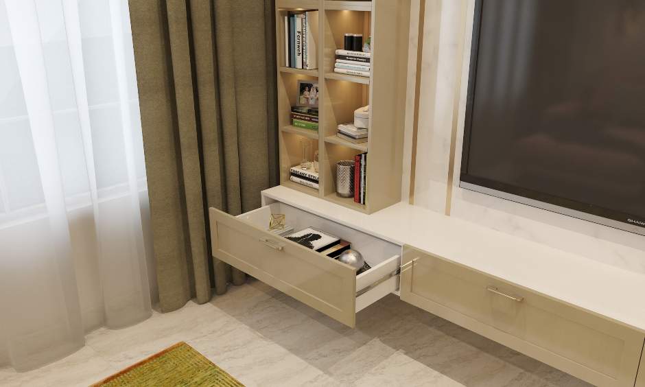 A living room TV unit with an attached tall bookshelf offers an organized space