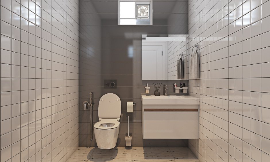 Modern 1bhk house bathroom design with white and grey tiles and marble flooring