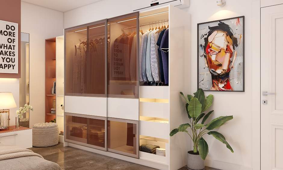 Modern bedroom design features a sliding door closet with tinted glass