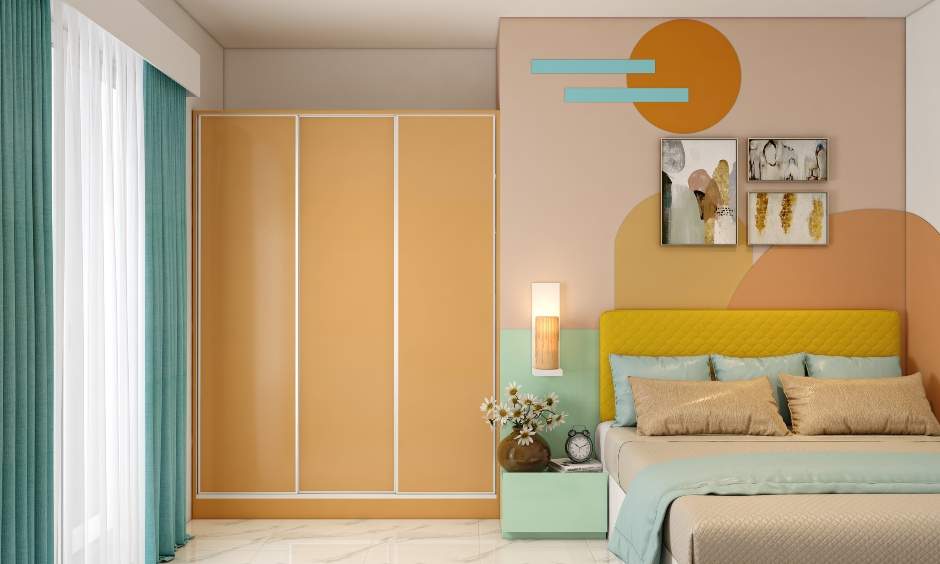 Multi-door wardrobe interior design in orange adds a pop of colour to the space