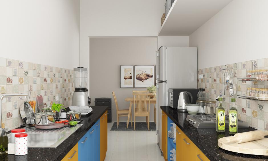 Compact non-modular kitchen with open racks and countertop clutter