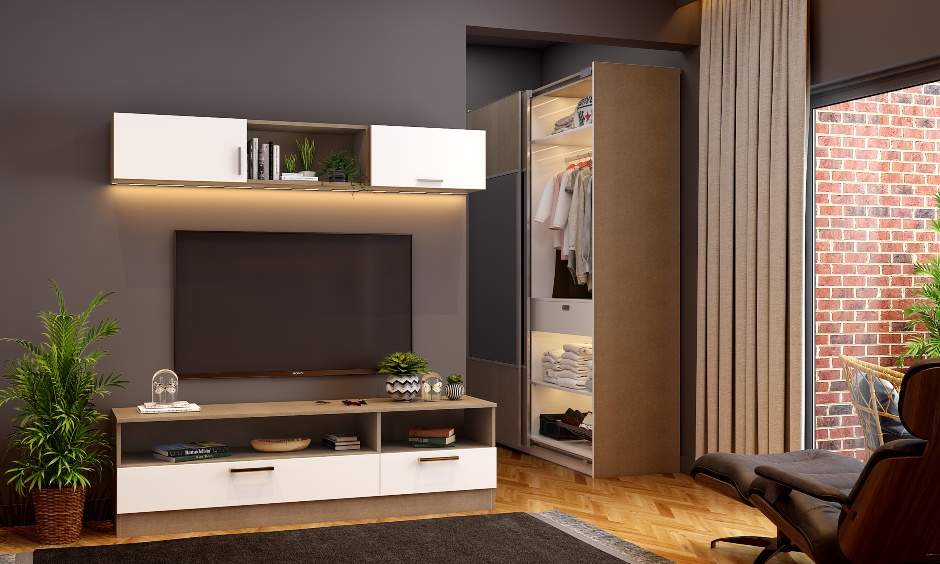 A spacious black bedroom with tv unit
