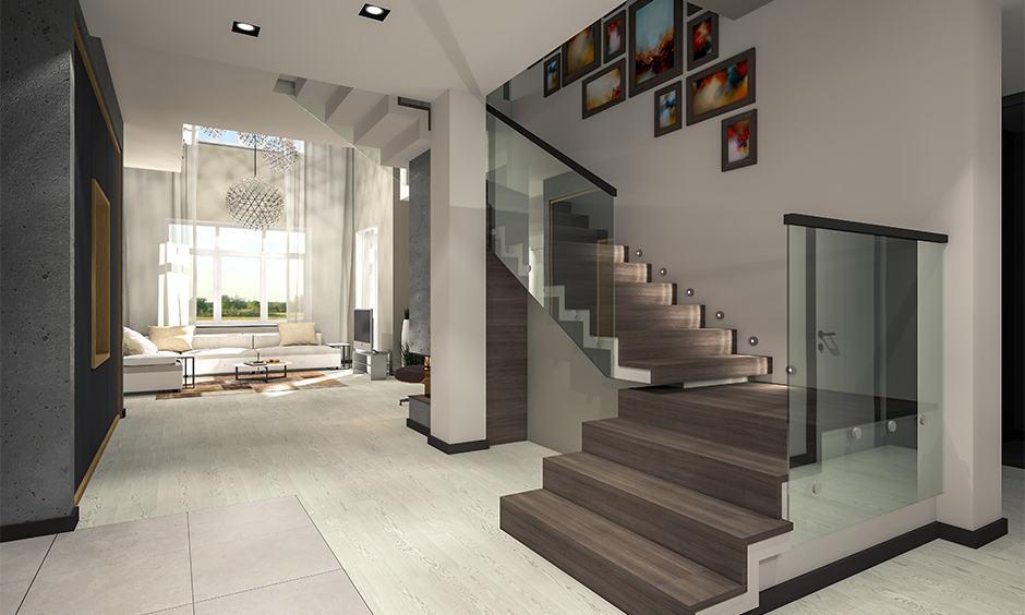Clockwise wooden staircase with open space underneath, following Vastu design principles