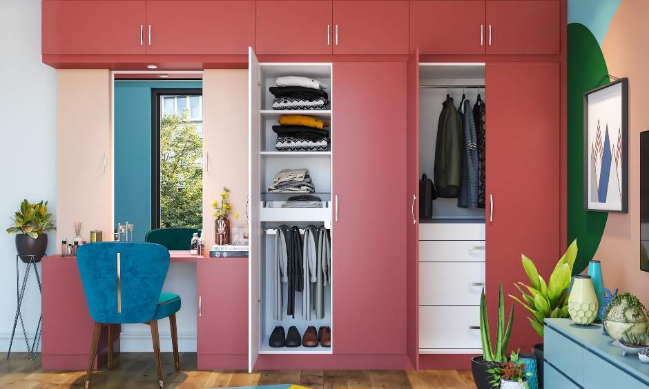 Twin wardrobe design with multiple compartments helps organise your items in your bedroom wardrobe