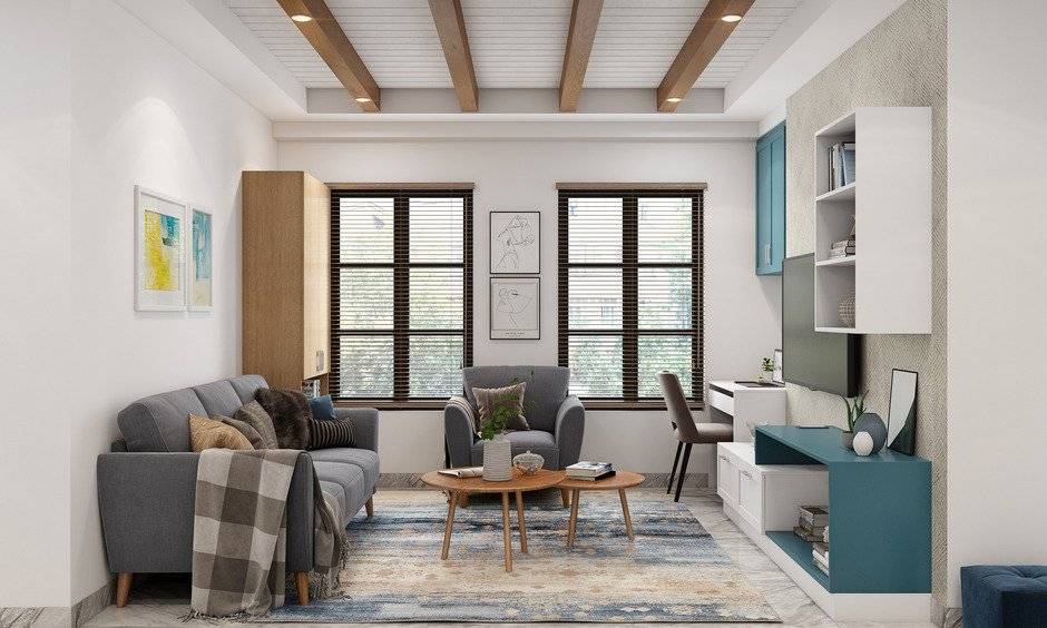 Living room room with a working table, sofa, center table and TV makes WFH friendly living room